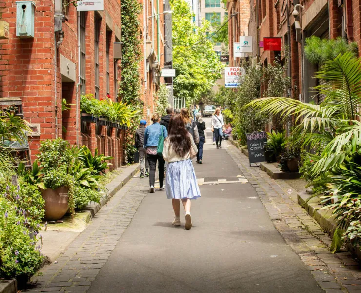 People walking down green Guildford Lane